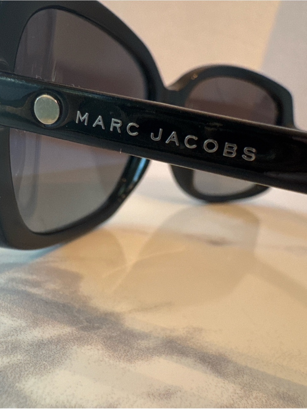 Marc Jacobs Black Women’s Sunglasses with Silver Logo Accent